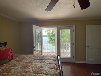 Multi- level home on Weiss Lake, located on Embos Island in - photo 21