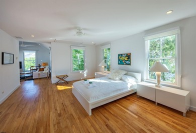 ICONIC OPEN BAYFRONT LOCATION! Welcome to 144 Bay Road, one of - photo 26
