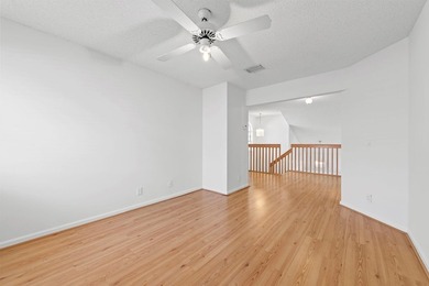 This light-filled home welcomes you into a spacious living room - photo 26
