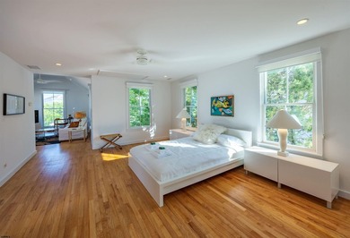 ICONIC OPEN BAYFRONT LOCATION! Welcome to 144 Bay Road, one of - photo 27