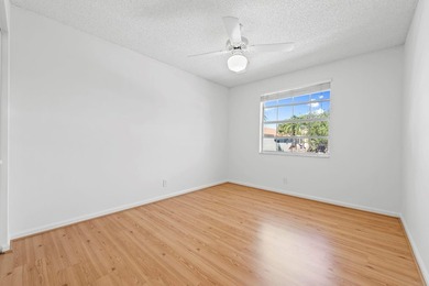 This light-filled home welcomes you into a spacious living room - photo 28