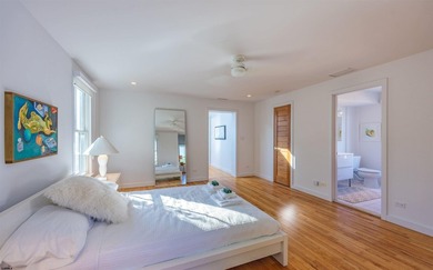 ICONIC OPEN BAYFRONT LOCATION! Welcome to 144 Bay Road, one of - photo 29