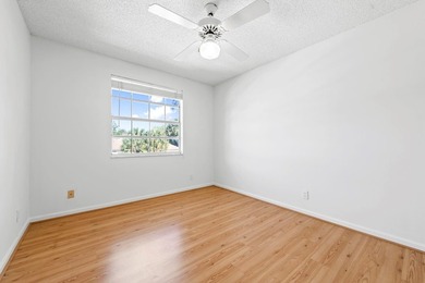 This light-filled home welcomes you into a spacious living room - photo 29