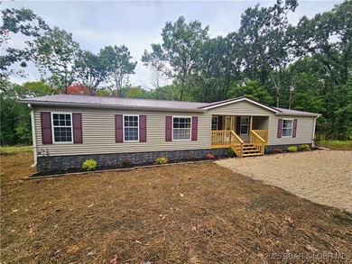 (private lake, pond, creek) Home Active Under Contract in Versailles Missouri