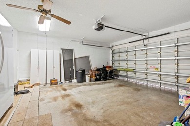 This light-filled home welcomes you into a spacious living room - photo 32