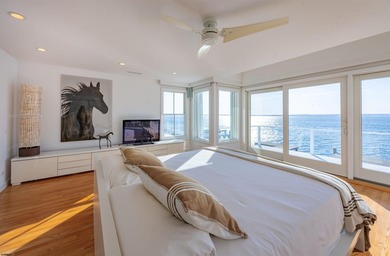 ICONIC OPEN BAYFRONT LOCATION! Welcome to 144 Bay Road, one of - photo 36