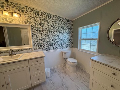 Located in the 55+ community of Brookhaven Village, this - photo 11