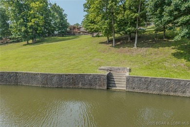 ABSOLUTELY GEORGOUS lake front building lot that is just over - photo 12