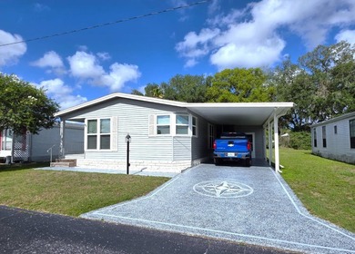THIS HOME IS ON LEASED LAND WITH A MONTHLY LOT RENT OF $650 AND - photo 3