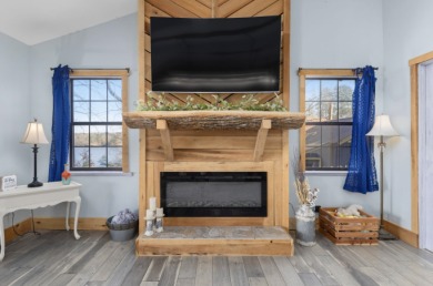 This charming two-story lake home offers stunning views and 1 - photo 12