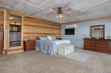 This charming two-story lake home offers stunning views and 1 - photo 13