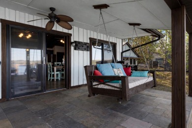 This charming two-story lake home offers stunning views and 1 - photo 18