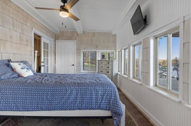 This charming two-story lake home offers stunning views and 1 - photo 23