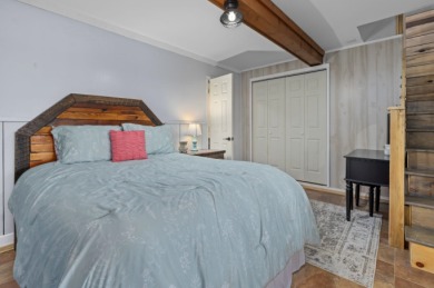This charming two-story lake home offers stunning views and 1 - photo 26