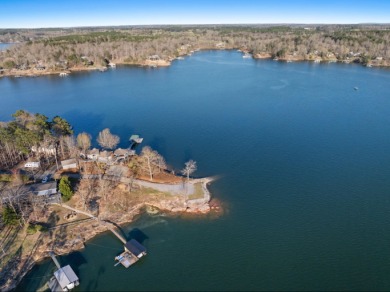 This charming two-story lake home offers stunning views and 1 - photo 31