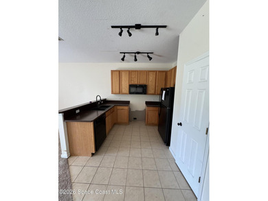 This 2-bedroom, 2.5-bath townhome offers over 1,500 sq. ft. of - photo 6