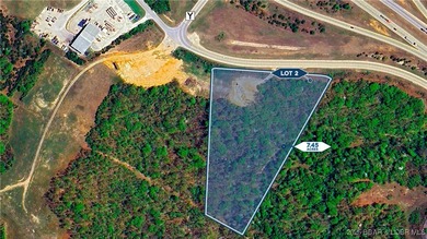 Great site in Linn Creek, next to the offramp for Y Road. Would - photo 6