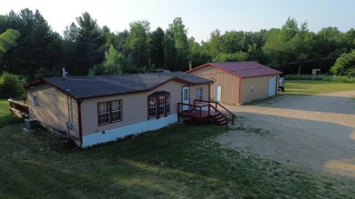 Lake Home For Sale in Harrison, Michigan