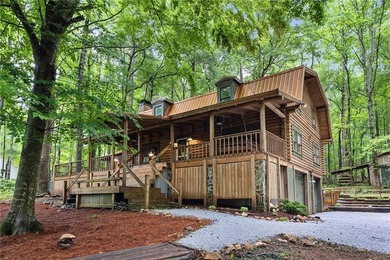 Absolutely charming and timeless, this classic lake cabin is - photo 1