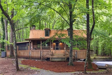 Absolutely charming and timeless, this classic lake cabin is - photo 3