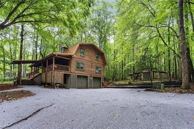 Absolutely charming and timeless, this classic lake cabin is - photo 4
