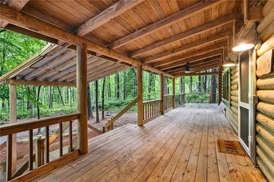 Absolutely charming and timeless, this classic lake cabin is - photo 9