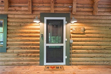 Absolutely charming and timeless, this classic lake cabin is - photo 10