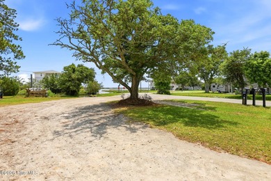 Wooded lot in Hampstead, NC on a small canal. Snug harbor has a - photo 8