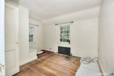 Nestled on approximately 1.1 acres in Southport, this classic - photo 12