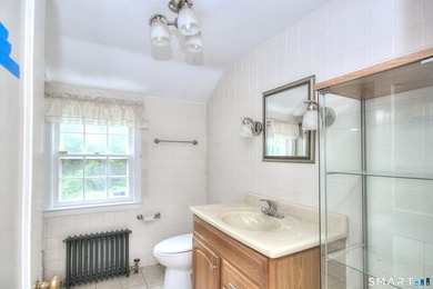 Nestled on approximately 1.1 acres in Southport, this classic - photo 19
