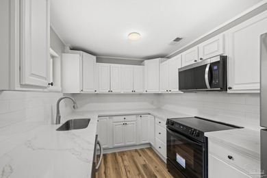 Check out this beautifully renovated home in the heart of - photo 3