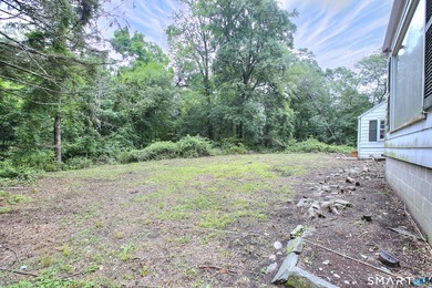 Nestled on approximately 1.1 acres in Southport, this classic - photo 27