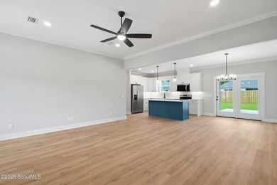This beautiful 4 bedroom, 2 1/2 bathroom stucco home has board - photo 13