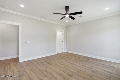 This beautiful 4 bedroom, 2 1/2 bathroom stucco home has board - photo 16