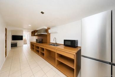 Located in Dyker Heights! Semi-attached 2-dwelling brick home on - photo 16