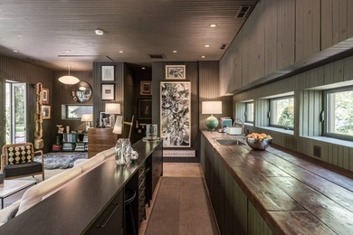 This one-of-a-kind designer home offers a striking departure - photo 8