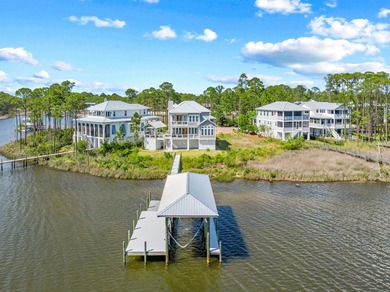 Nestled in the heart of Santa Rosa Beach, this bayfront custom - photo 1