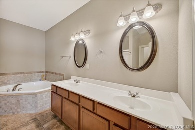 Lake front life never looked so good! Check out this 3 bedroom 2 - photo 21