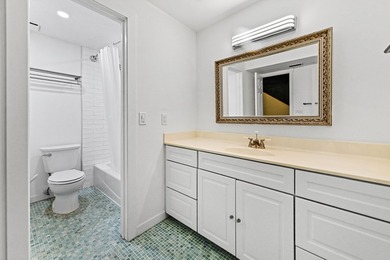 Stylishly updated 2-bedroom, 1.5-bathroom corner unit in the - photo 24
