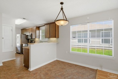 Charming end-unit cottage with an open floor plan that is - photo 7