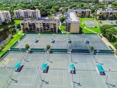 Stylishly updated 2-bedroom, 1.5-bathroom corner unit in the - photo 41