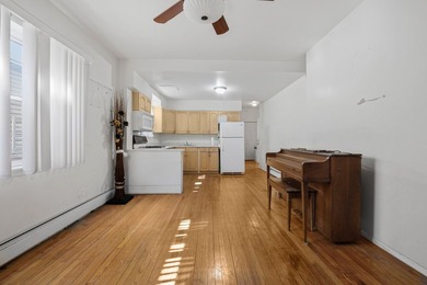 This well-positioned two-family home offers a ton of space - photo 3