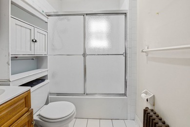 This well-positioned two-family home offers a ton of space - photo 4