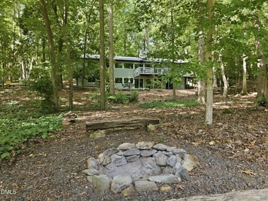 Set on two lots totaling 1.3 acres with panoramic views of the - photo 3