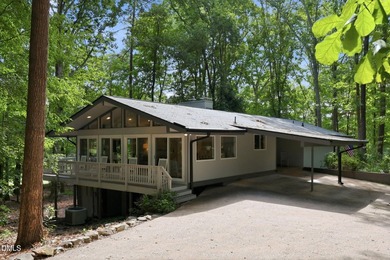 Set on two lots totaling 1.3 acres with panoramic views of the - photo 4