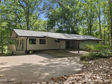 Set on two lots totaling 1.3 acres with panoramic views of the - photo 5
