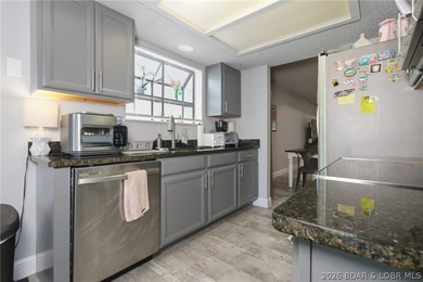 Experience the best of Lake living in this beautifully remodeled - photo 11