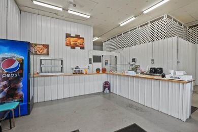 Fantastic commercial opportunity in the heart of Houghton Lake! - photo 4