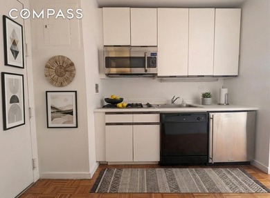 Welcome to Unit 28D, a bright and efficiently designed studio - photo 3