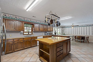 Secluded Brick Ranch Retreat on 20+ Acres with Private Lake & - photo 11